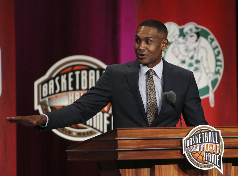 Grant Hill speaks during induction ceremonies for the Basketball Hall of Fame, Friday, Sept. 7, 2018, in Springfield, Mass. (AP Photo/Elise Amendola)