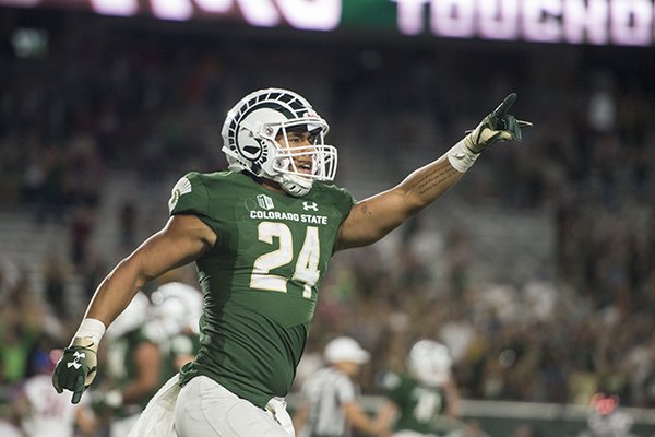 Colorado State running back Izzy Matthews celebrates after scoring the game-winning touchdown in the fourth quarter of a game against Arkansas on Saturday, Sept. 8, 2018, at Canvas Stadium in Fort Collins, Colo.
