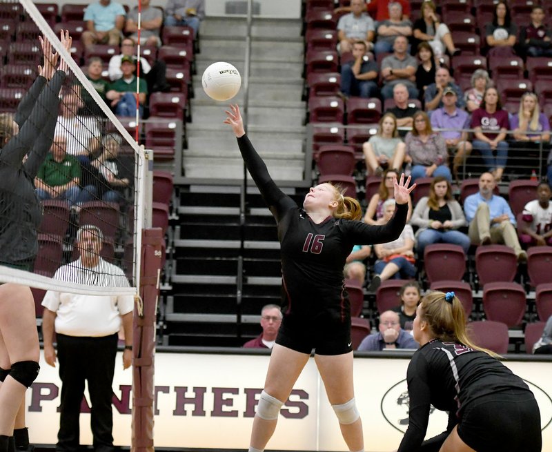 Bud Sullins/Special to Siloam Sunday Siloam Springs senior Reigan Brown goes for a tip over the Alma block Thursday in the Lady Panthers' 3-0 sweep of the Airedales.