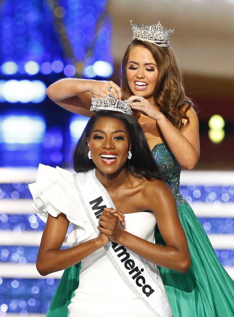 Miss New York Nia Franklin reacts after being named Miss America 2019, as she is crowned by last year's winner Cara Mund, Sunday, Sept. 9, 2018, in Atlantic City, N.J. (AP Photo/Noah K. Murray)