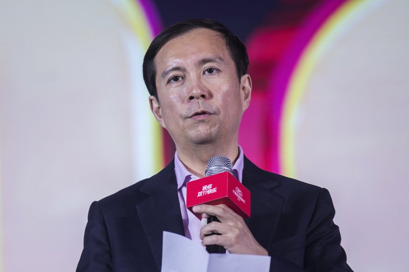 In this Nov. 12, 2017, photo, Daniel Zhang, CEO of Alibaba Group, speaks at the media center at the conclusion of the &quot;Singles' Day&quot; global online shopping festival in Shanghai. Jack Ma, who founded e-commerce giant Alibaba Group and helped to launch China's online retailing boom, announced Monday, Sept. 10, 2018 that he will step down as the company's chairman next September. In a letter released by Alibaba, Ma said he will be succeeded by CEO Daniel Zhang. Ma handed over the CEO's post to Zhang in 2013 as part of what he said was a succession process developed over a decade. (Chinatopix via AP)