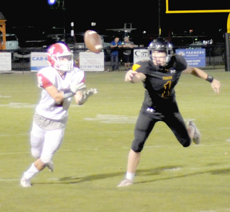 MARK HUMPHREY ENTERPRISE-LEADER Prairie Grove sophomore Cade Grant broke up this Dardanelle pass. The Tigers were beaten 35-17 by the Sandlizards Friday leaving Prairie Grove still searching for its first football win of the 2018 season.