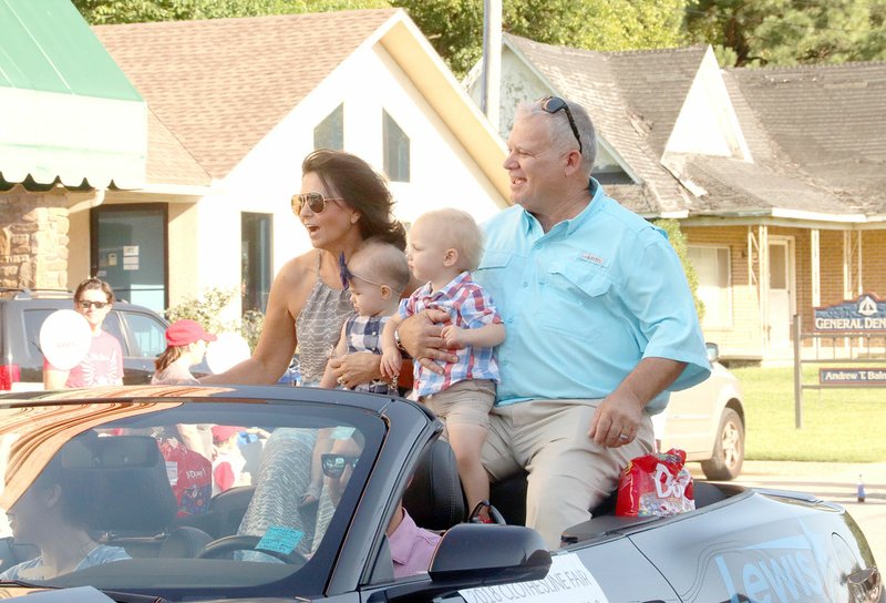 LYNN KUTTER ENTERPRISE-LEADER Randall and Cindy Rieff of Prairie Grove served as grand marshals for the 2018 Clothesline Fair parade. Randall Rieff is a Prairie Grove volunteer firefighter and worked at the now Harps grocery store for more than 46 years. He received the city&#x2019;s Buddy Lyle Citizenship Award in 2016. Cindy has worked at Dr. Bain&#x2019;s dental office for 32 years. They are both active members of Prairie Grove First United Methodist Church.