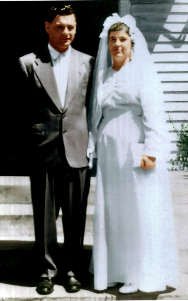 Submitted Photo Winfield and Laura Fern Poe pose on the steps of the chapel at the Church of God Holiness school at Mt. Zion, Mo., on their wedding day, Aug. 4, 1948. The chapel is on the campus where they first met when Winfield enrolled in Laura's class.