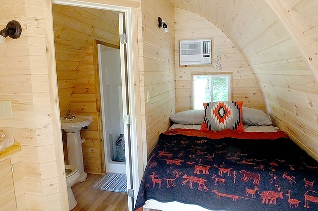 Lynn Atkins/The Weekly Vista Finishing touches are still in the works for Bella Vista's first "glamping pod" at Blowing Springs Park. The pod sleeps two people and has its own bathroom, as well as a microwave and a small refrigerator.
