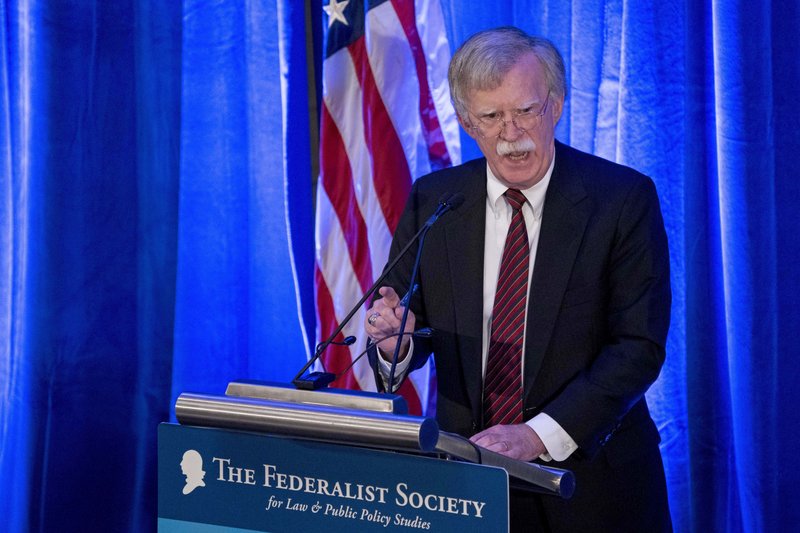  In this Monday, Sept. 10, 2018 file photo, National Security Adviser John Bolton speaks at a Federalist Society luncheon at the Mayflower Hotel, in Washington. 