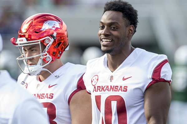 Arkansas defensive end Randy Ramsey (10) watches warmups prior to the Razorbacks' game against Colorado State on Saturday, Sept. 8, 2018, in Fort Collins, Colo.
