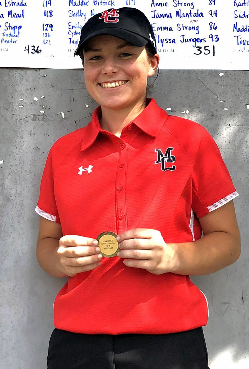 Rick Peck/Special to McDonald County Press McDonald County's Lily Allman received the first-place medal for winning the Marshfield High School Girls' Golf Tournament held Sept. 4 at Whispering Oaks Golf Course in Marshfield.