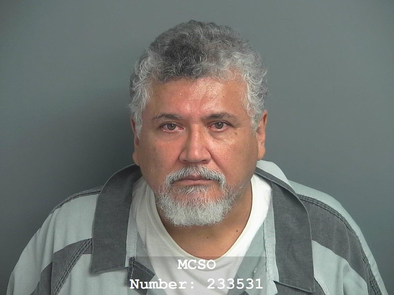 This undated photo provided by the Montgomery County Sheriff's Office shows Father Manuel LaRosa-Lopez. LaRosa-Lopez, was arrested Tuesday, Sept. 11, 2018, by police in Conroe, Texas and is accused of fondling two people when they were teenagers and he was a priest at Sacred Heart Catholic Church in Conroe. He is charged with four counts of indecency with a child. (Montgomery County Sheriff's Office via AP)