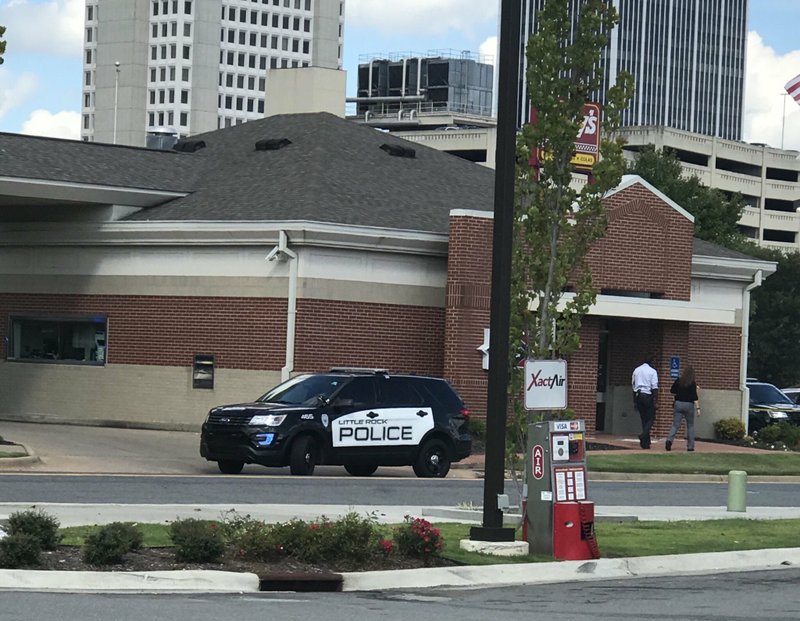 Little Rock police respond to a robbery at Centennial Bank, 718 Broadway, on Thursday, Sept. 13, 2018.