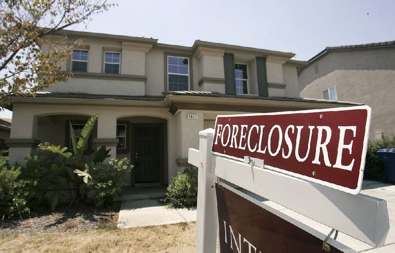 A foreclosed home in Sacramento, Calif., is shown in July 2008, after home values plummeted when the housing bubble burst in 2007. 