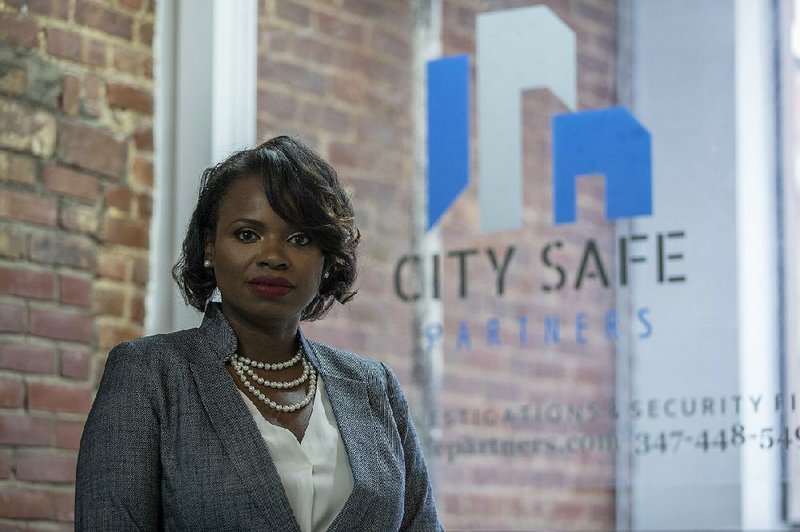 In this Sept. 7 photo Soyini Chan-Shue poses for a portrait at City Safe Partners’ office in New York.