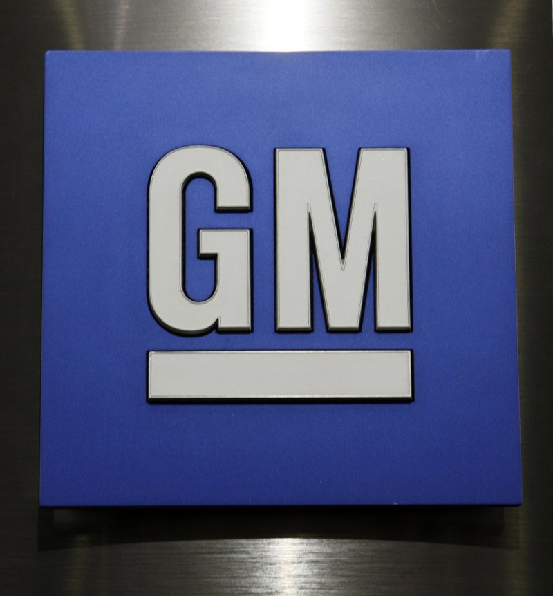 This Jan. 25, 2010, file photo, shows a General Motors Co. logo during a news conference in Detroit. General Motors on Thursday, Sept. 13, 2018, is recalling more than a million big pickup trucks and SUVs in the U.S. because of power-assisted steering problems that have been cited in a number of accidents.  (AP Photo/Paul Sancya, File)