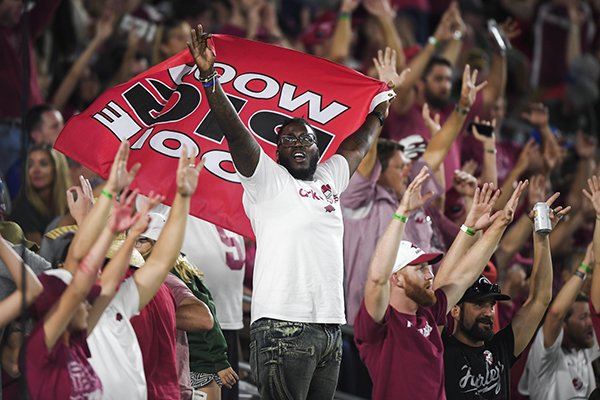 Arkansas Razorbacks fans cheer during the third quarter of a football game, Saturday, September 8, 2018 at Colorado State University in Fort Collins, Colo.