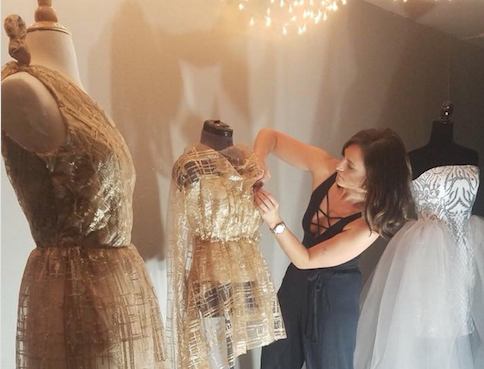 Alyssa Graves, 25, of Bentonville works on designs to show at New York Fashion Week.