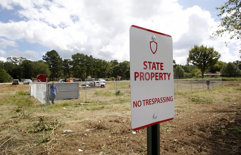 Property near 19th Street and College Avenue in Fayetteville is being cleared Thursday by the University of Arkansas. A proposal to sell 4.69 acres to nonprofit Serve NWA was set to be heard Thursday by the university’s board. The university is also seeking to sell 52 acres of nearby land.