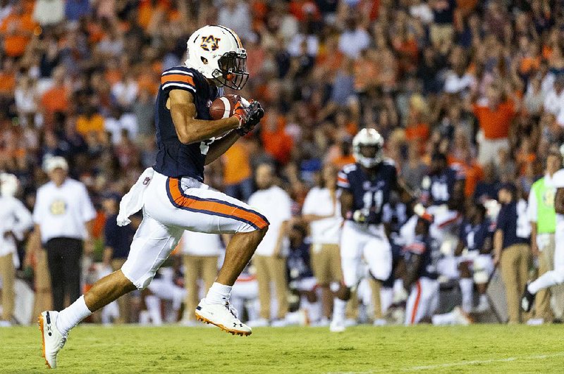 Auburn wide receiver Anthony Schwartz scores a touchdown last Saturday in the Tigers’ 63-9 victory over Alabama State. No. 7 Au- burn hosts No. 12 LSU today in a game that could determine which team can contend with Alabama for the SEC West Division title.