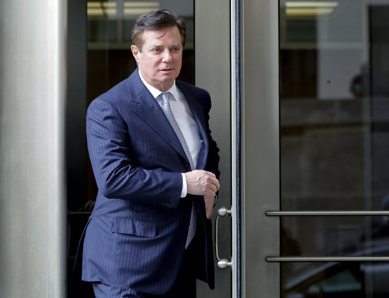  In this Feb. 14, 2018 file photo, Paul Manafort, President Donald Trump's former campaign chairman, leaves the federal courthouse in Washington. 