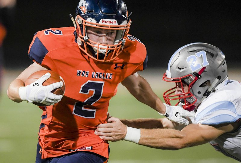 NWA Democrat-Gazette/CHARLIE KAIJO Rogers Heritage High School Brett Lemmond (2) runs the ball during a football game, Friday, September 14, 2018 at Rogers Heritage High School in Rogers.