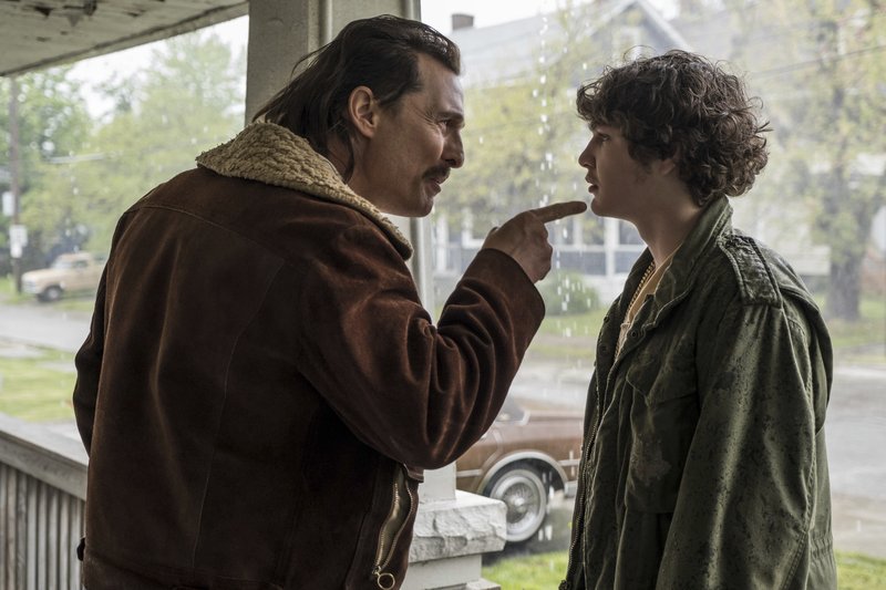 This image released by Sony Pictures shows and Matthew McConaughey, left, and Richie Merritt in a scene from &quot;White Boy Rick.&quot; (Scott Garfield/Sony/Columbia Pictures and Studio 8 via AP)