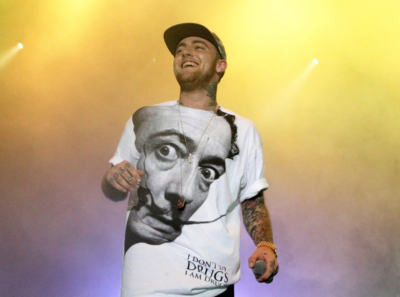  In this July 13, 2013, file photo, Rapper Mac Miller performs on his Space Migration Tour at Festival Pier in Philadelphia. 