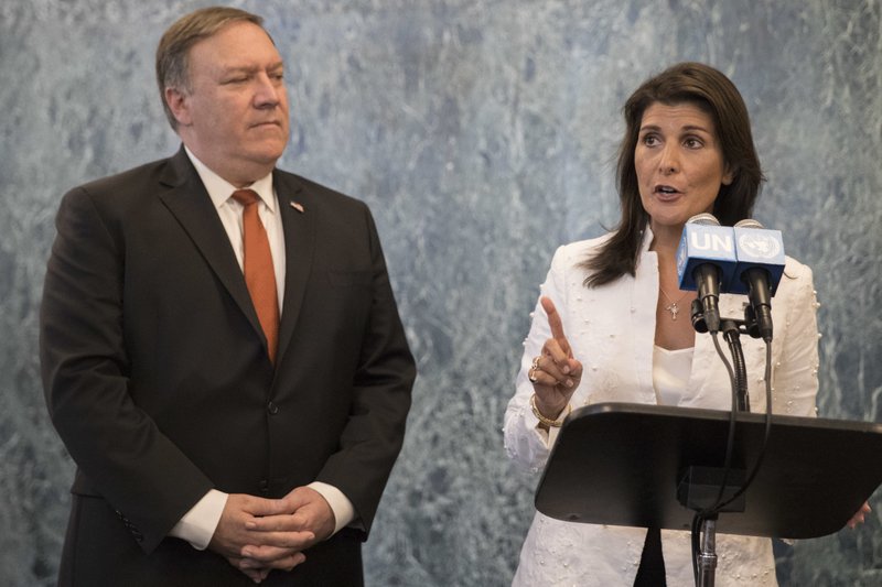 In this Friday, July 20, 2018 file photo, U. S. Secretary of State Mike Pompeo, left, and American Ambassador to the United Nations Nikki Haley speak to reporters at United Nations headquarters. (AP Photo/Mary Altaffer, File)