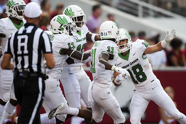 North Texas wide receiver Keegan Brewer (18) reacts after scoring a touchdown during the first quarter of a game, Saturday, Sept. 15, 2018, at Donald W. Reynolds Razorback Stadium in Fayetteville.
