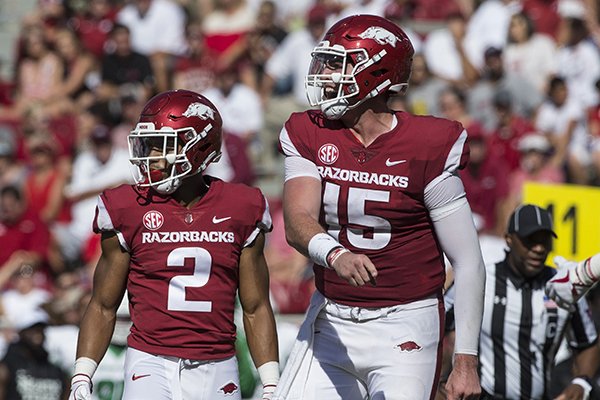 Arkansas quarterback Cole Kelley (15) and running back Chase Hayden line up for a play during the second quarter of a game against North Texas on Saturday, Sept. 15, 2018, at Razorback Stadium in Fayetteville. 