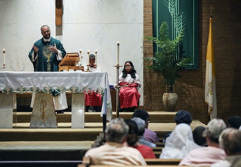 The Rev. Josh Stengel talks to his congregation about the recent scandals in the Catholic Church during Mass at Our Lady of Good Counsel Catholic Church in Little Rock on Sunday.