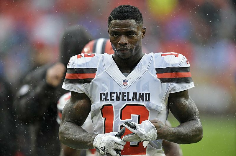 Cleveland Browns' Josh Gordon walks off the field after an NFL football game against the Pittsburgh Steelers in Cleveland.
