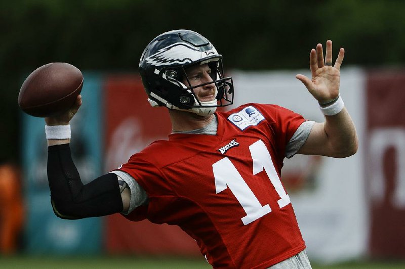 Philadelphia Eagles quarterback Carson Wentz throws during practice Aug. 21 at the team’s training facility in Philadelphia. Wentz has been cleared to return and is slated to start for the Eagles when they host the Indianapolis Colts on Sunday.