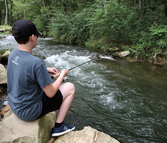 The Sentinel-Record/Corbet Deary EASY GOING: Dry Run Creek is a great location where youths can fish in waters that are bountiful with trophy-class trout.