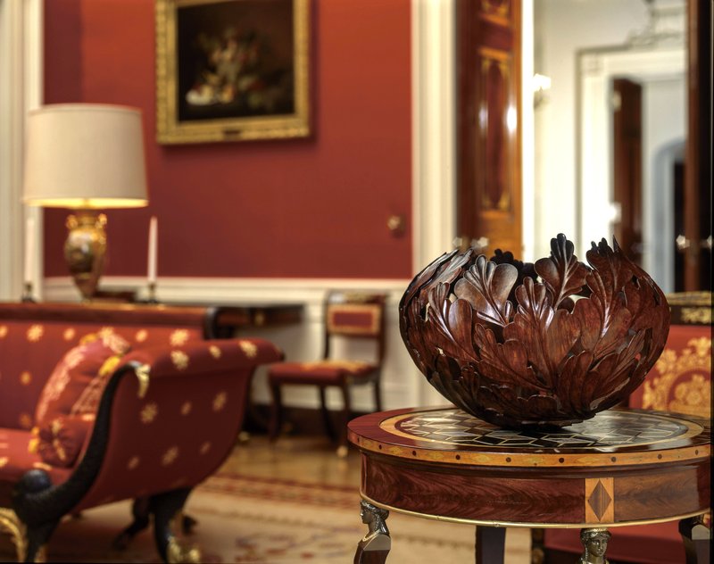 Some of the pieces in “The White House Collection of American Crafts: 25th Anniversary Exhibit” were once on display in the White House. New Beginnings by Ronald F. Fleming fit in perfectly in The Red Room.