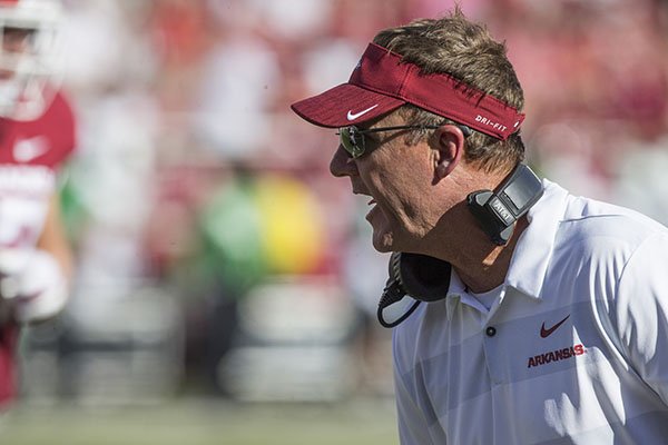 Arkansas coach Chad Morris talks to players during a game against North Texas on Saturday, Sept. 15, 2018, in Fayetteville. 