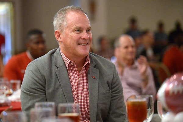 Hunter Yurachek, director of athletics at the University of Arkansas, laughs Friday, Aug. 17, 2018, during the annual Kickoff Luncheon at the Northwest Arkansas Convention Center in Springdale.