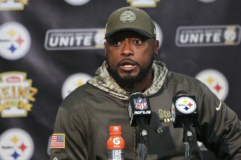 Pittsburgh Steelers head coach Mike Tomlin answers questions at the news conference after an NFL football game against the Tennessee Titans, Friday, Nov. 17, 2017, in Pittsburgh. 