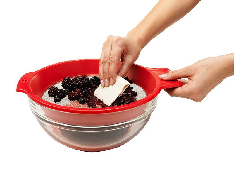 Chef'n Sift'n Sieve rests atop a standard 4-quart bowl and includes a scraper. The multi-tasking tool can be used as a sifter for flour or a strainer for making smooth purees.
