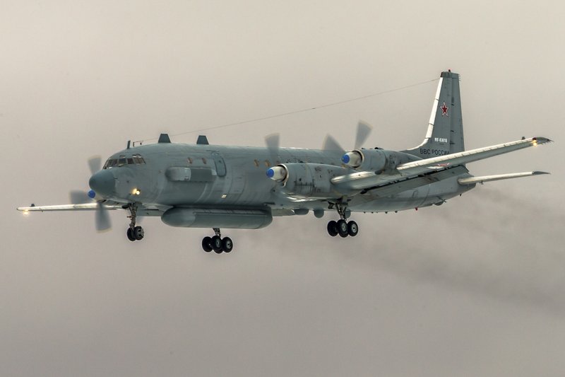 In this photo taken on Saturday, March 4, 2017, a Il-20 electronic intelligence plane of the Russian air force flays near Kubinka airport, outside Moscow, Russia. An Il-20 aircraft was shot down Tuesday, Sept. 18, 2018 by a Syrian missile over the Mediterranean Sea, killing all 15 people on board, as the Syrian military fired on Israeli fighter jets attacking targets in northwestern Syria. (AP Photo/Marina Lystseva)
