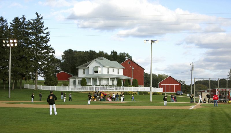 FILE - In this Oct. 2, 2014, file photo, teams play at the "Field of Dreams" during a fall tournament in Dyersville, Iowa. Austin Pape, of Dyersville, accused of driving onto and damaging the baseball field made famous by the 1989 movie "Field of Dreams" has changed his plea to guilty. Dubuque County court records say Pape entered the plea Monday, Sept. 17, 2018, the day his trial was to begin on a felony charge of criminal mischief. His sentencing is scheduled for Nov. 13. (Dave Kettering/Telegraph Herald via AP, File)

