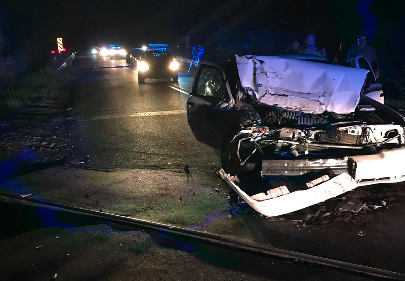 This photo taken by Pulaski County sheriff's office Lt. Cody Burk shows a Ford Crown Victoria after it crashed into a train Tuesday night in Little Rock.