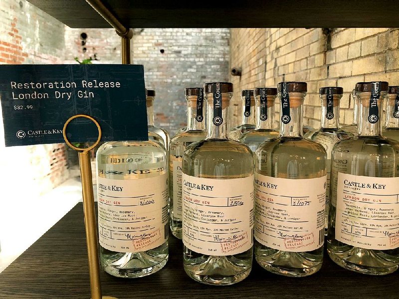 Bottles of gin produced at Castle & Key Distillery in Millville, Ky., are displayed last week at the distillery’s gift shop. The revived distillery’s new bourbon won’t reach consumers until around 2021.