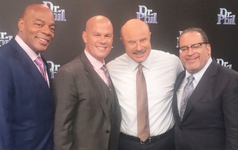 Officer Tommy Norman stands with Dr. Phil and two other panelists during his trip to Los Angeles for filming. Photo courtesy of Tommy Norman