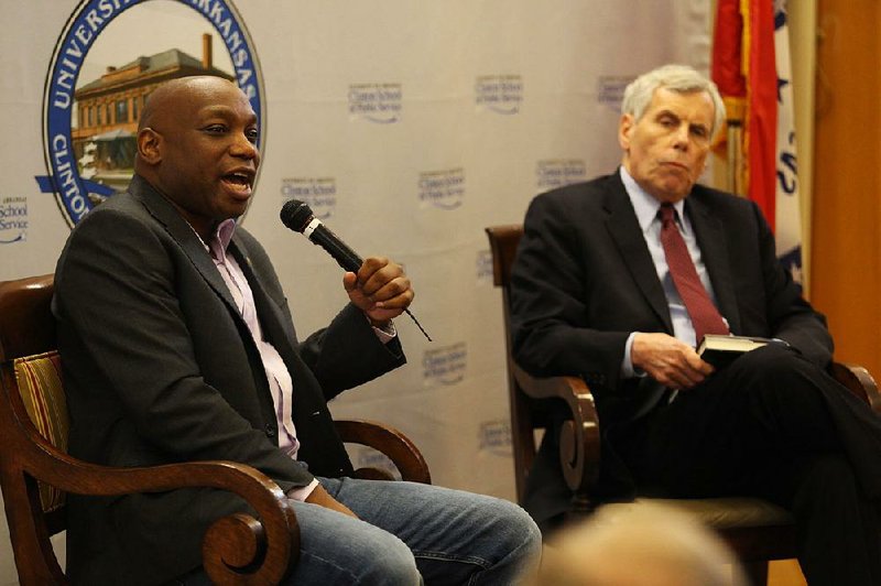 Sports journalist Howard Bryant (left) talks with Skip Rutherford, dean of the Clinton School of Public Service, on Sept. 7 as part of the Clinton School Speaker Series. Photo courtesy of the Clinton School. 