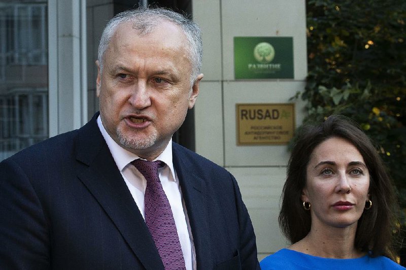 Russian National Anti-doping Agency head Yuri Ganus (left) and its deputy CEO Margarita Pakhnotskaya speak to the media Thursday in Moscow. The World Anti-Doping Agency has reinstated Russia, ending a nearly three-year suspension caused by state-sponsored doping.