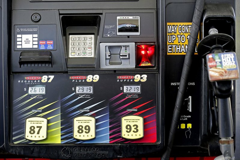 In this June 14, 2018, photo, gasoline prices are displayed on a pump at Sheetz along the Interstate 85 and 40 corridor near Burlington, N.C. 