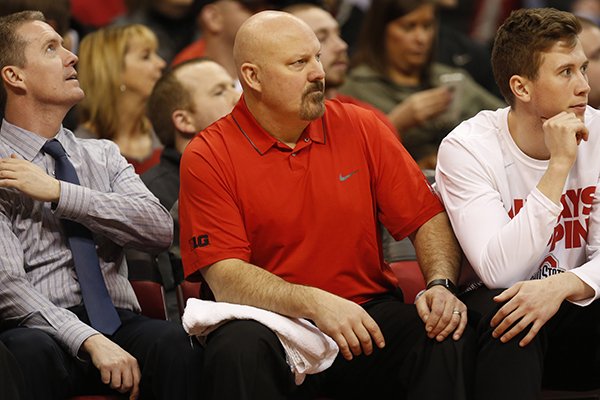 Dave Richardson (center) spent 12 seasons as the basketball strength coach at Ohio State from 2005-17. 