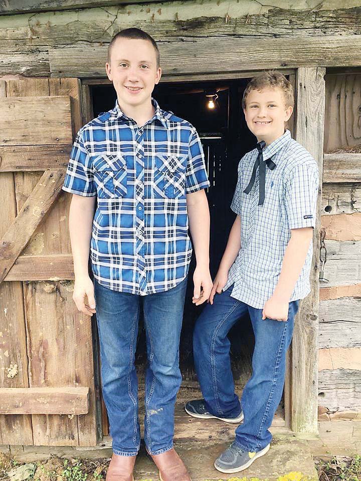 Pottsville Junior High School History Club members Issac Drew, left, and Austin Ford are among the students who will perform at 10 a.m. Friday in a re-enactment of the 150th anniversary of the Butterfield Stagecoach coming through the town. The public is invited.