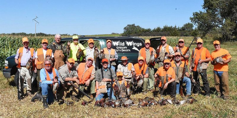 A party of happy Arkansas hunters ended their three-day hunt with a mess of pheasants last Sunday near Gregory, S.D.