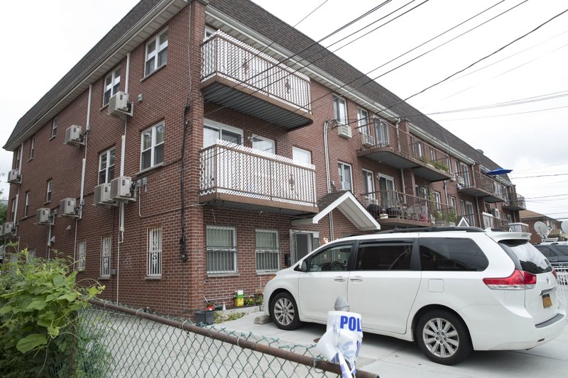 The house were five people were stabbed overnight is seen, Friday, Sept. 21, 2018, in New York. Police say the people, including three infants, were stabbed at an overnight day care center in New York City. (AP Photo/Mary Altaffer)