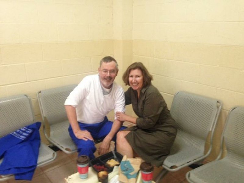 John Wesley Downs and his sister, Julie Downs Van Woy, are shown during her visit to Qatar’s central prison last year. 